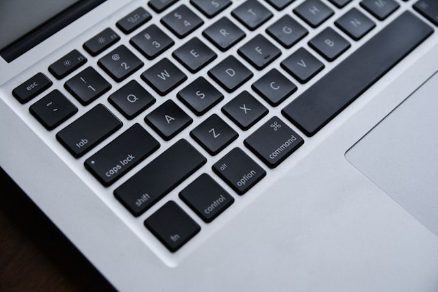 Close-up of laptop keyboard representing technical SEO optimization, website development, and backend performance improvements